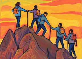 Un groupe de personnes escale une montagne.