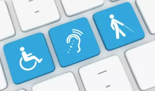Clavier avec touches symbolisant le handicap moteur, auditif et visuel