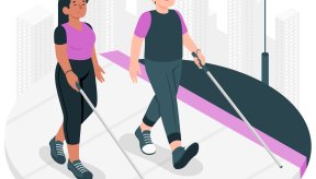 Deux personnes non-voyantes se balladent tout en discutant (illustration)